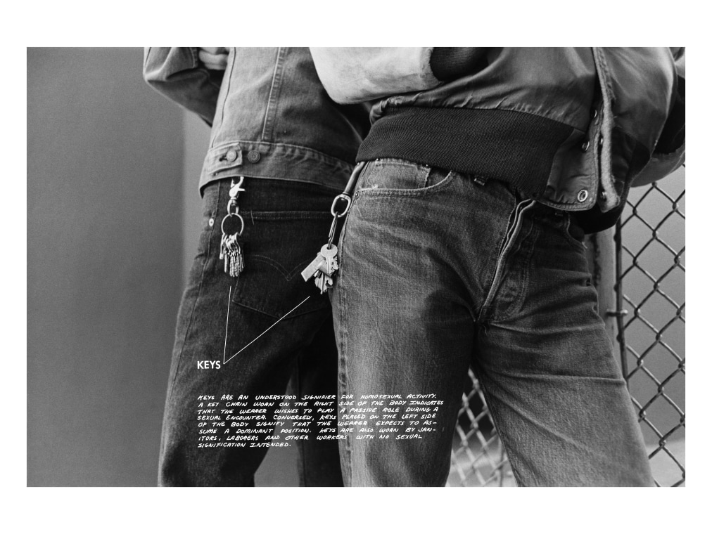 Two men wearing jeans have their keys shown in medium close up and a written description writes about how key placement indicates information about the person in relationships.