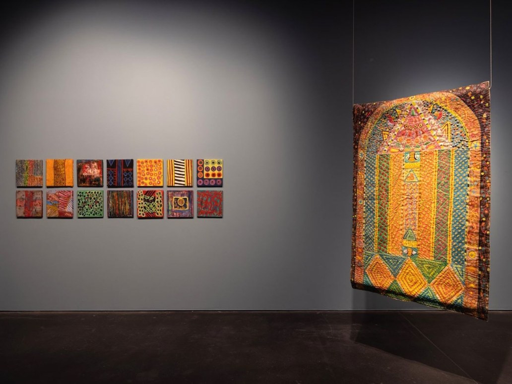 Left to right: Pacita Abad, Door to Life (1998–2004); Door Connects Me to the Greatest Happiness I Have Known (1999). Oil, painted cloth, buttons stitched on padded canvas. Exhibition view: Pacita Abad, I Thought the Streets Were Paved With Gold, Jameel Arts Centre, Dubai (13 September 2021–13 February 2022). Courtesy Jameel Arts Centre.