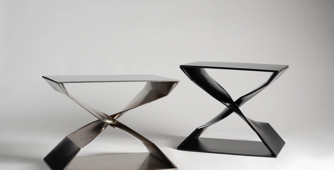 Carol Egan&#039;s X stools in stainless steel and blackened bronze.