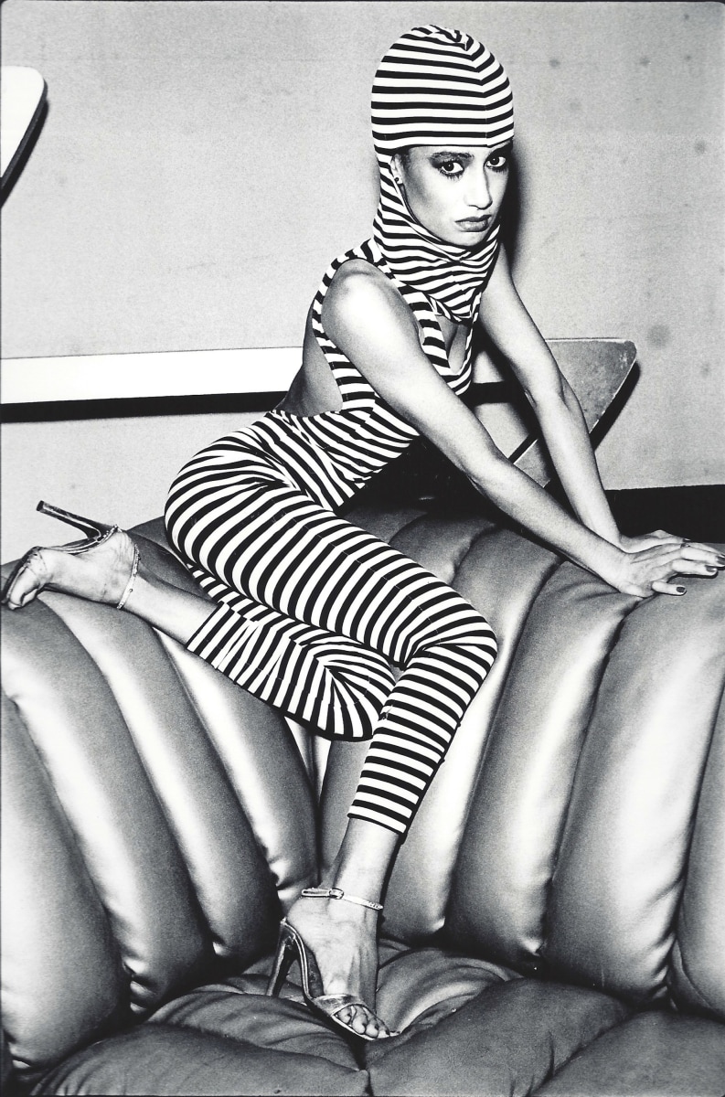 Woman in striped outfit by Arlene Gottfried