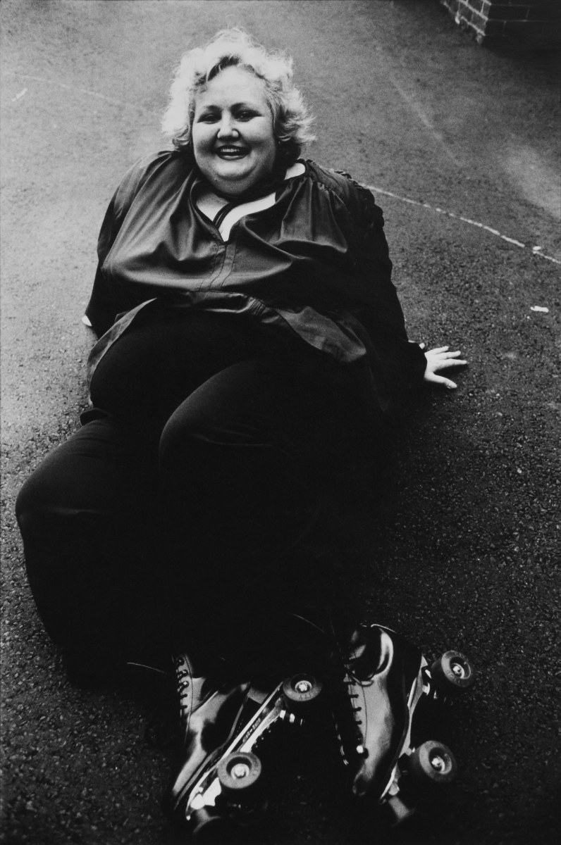 Woman with roller skates by Arlene Gottfried