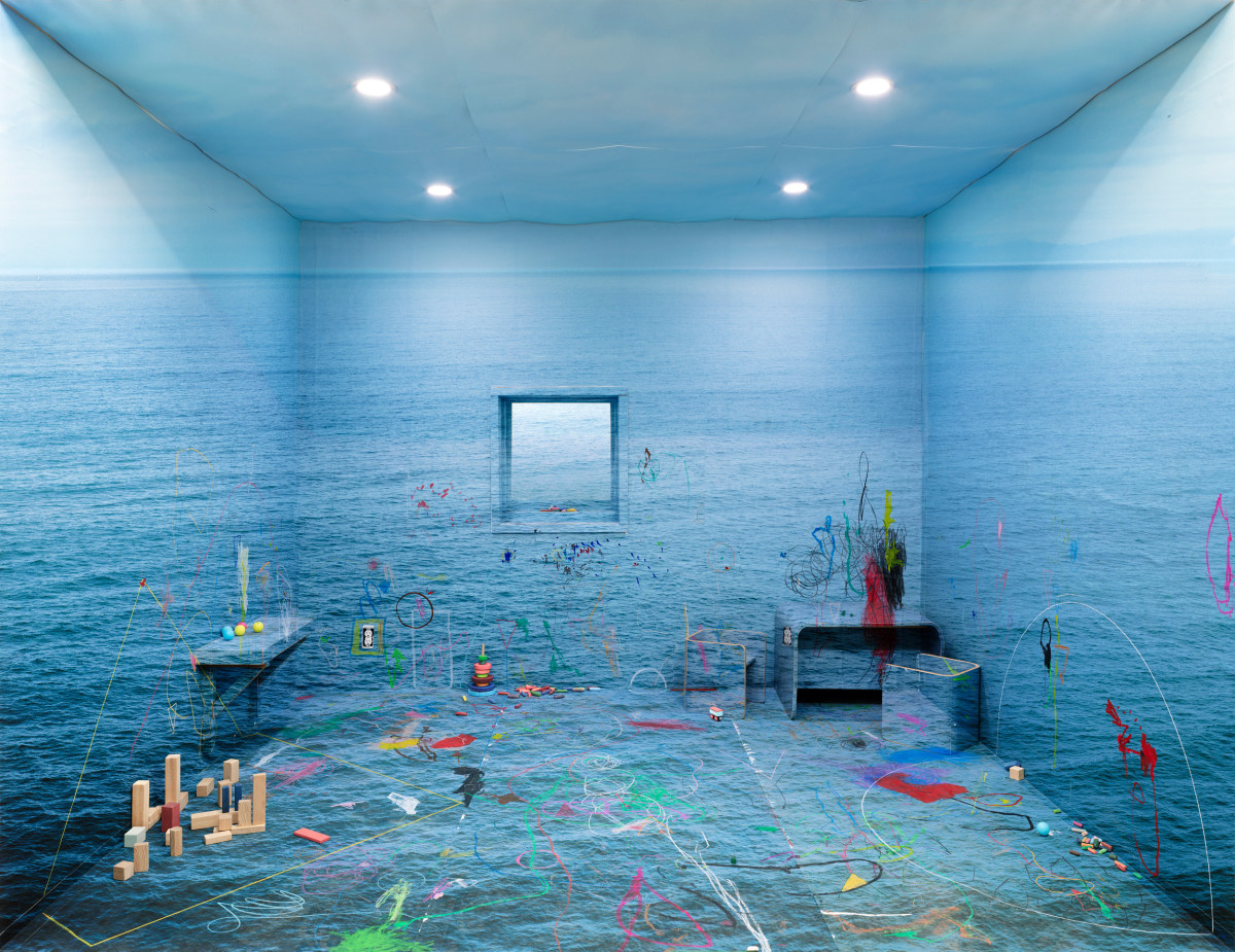 Photograph of a sea scape with paint overlay sculpted within the perspective of a room