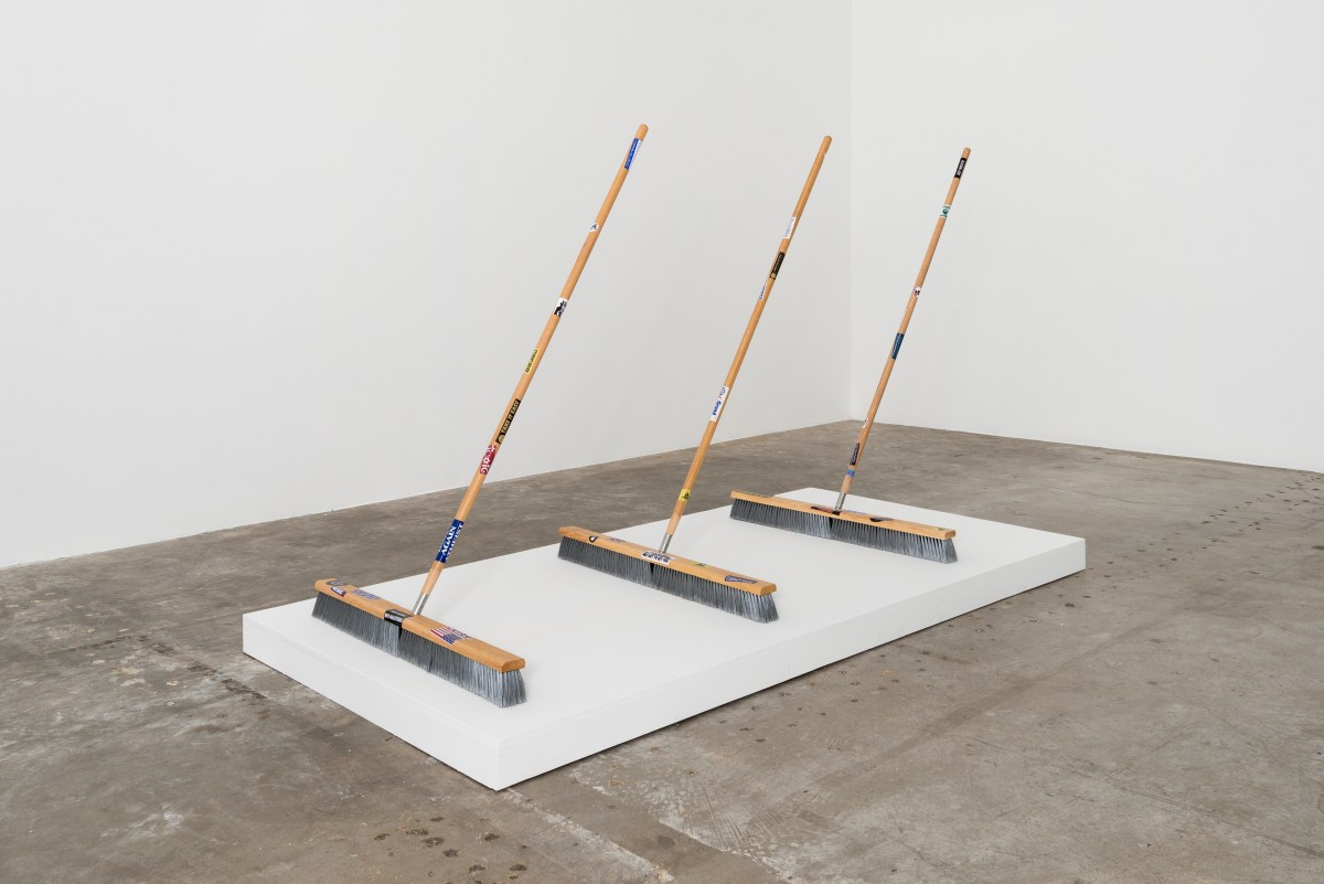 Josh Reames Broom, 2017 Push-brooms and scaled bumper stickers  57 x 36 x 32 in (each)