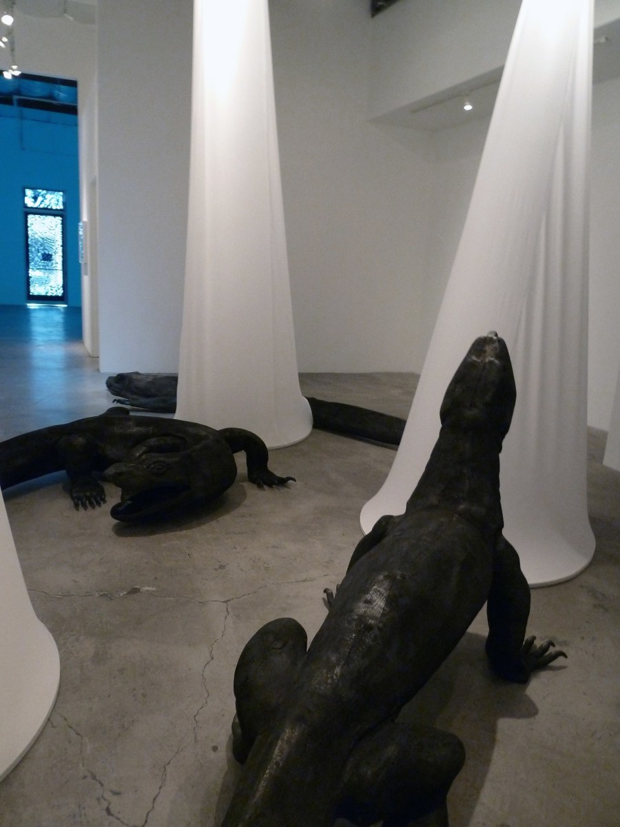 Installation View of Marisol Rend&oacute;n: So, Dragons Do Exist?  2013 Wood, fabric, lighting Variable dimensions.