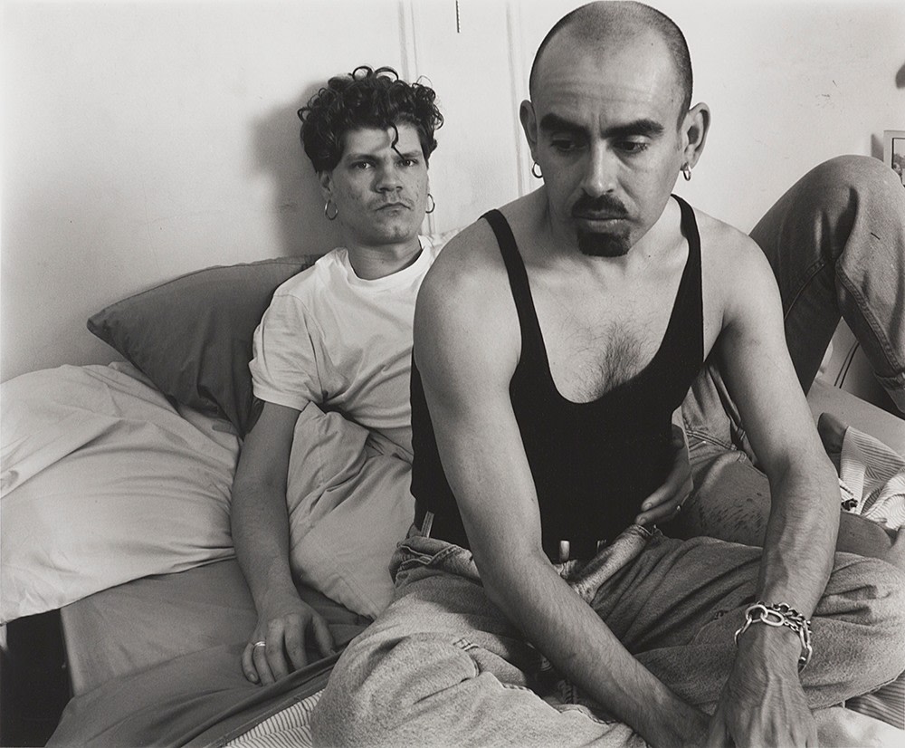 Two men on bed by Stephen Barker