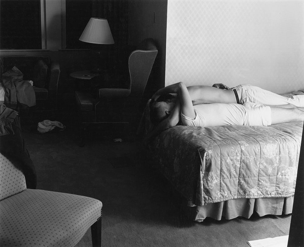 Two men embracing by Stephen Barker