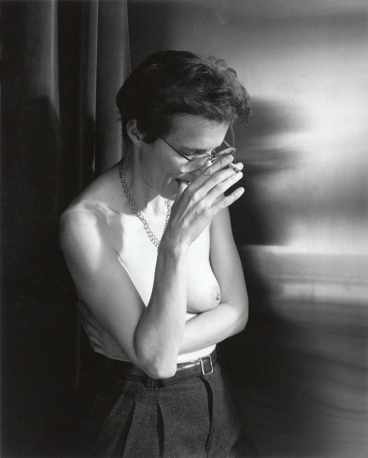 Woman smoking by Stephen Barker