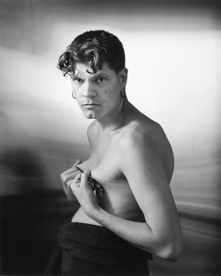 Man pulling nipples by Stephen Barker