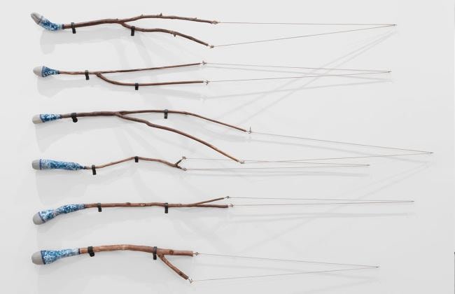 Griselda Rosas, Cabeza de Vaca, 2022. Found wood, cement, screenprint, and rubber from Michoac&aacute;n, dimensions variable. Courtesy of the artist. Photography: Daniel Lang for MCASD.