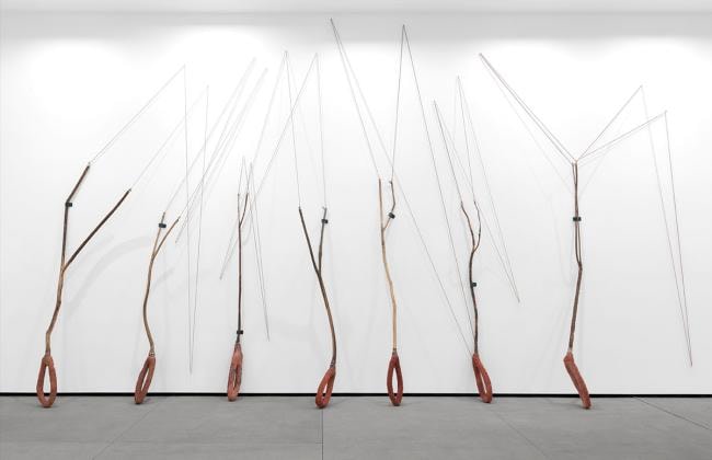 Griselda Rosas, Un camello en el ojo de una aguja [A Camel in the Eye of a Needle] 2022. Found wood, cement, pigment, and rubber from Michoac&aacute;n, dimensions variable. Courtesy of the artist. Photography: Daniel Lang for MCASD.