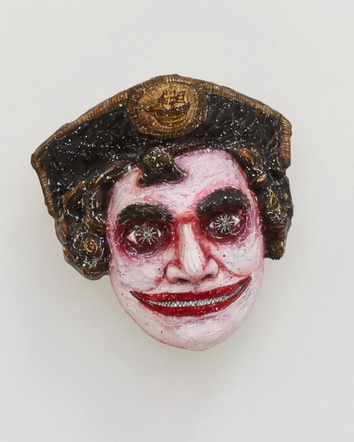 3-D printed and hand painted sculpture of mask of Christopher Columbus