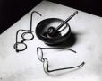 Andr&eacute; Kert&eacute;sz -  Mondrian's Glasses and Pipe, 1926.  | Bruce Silverstein Gallery