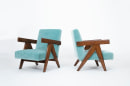 Pierre Jeanneret's Pair of &quot;Upholstered Easy&quot; lounge chairs, full side and front diagonal views