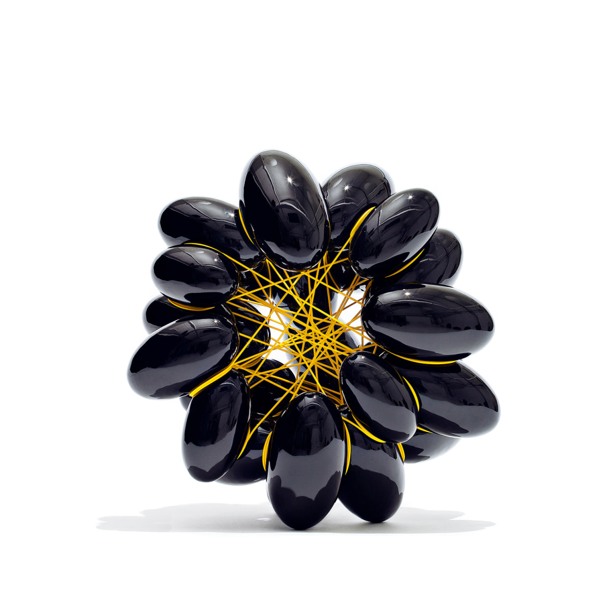 Steen Ipsen, (Danish, b,1966).&nbsp;Ellipse 1,&nbsp;2021. 17.25&rdquo; H x 17.25&rdquo; W x 13.75&rdquo; D. Black glazed earthenware with yellow PVC. Photo by Jeppe Gudmundsen-Holmgreen