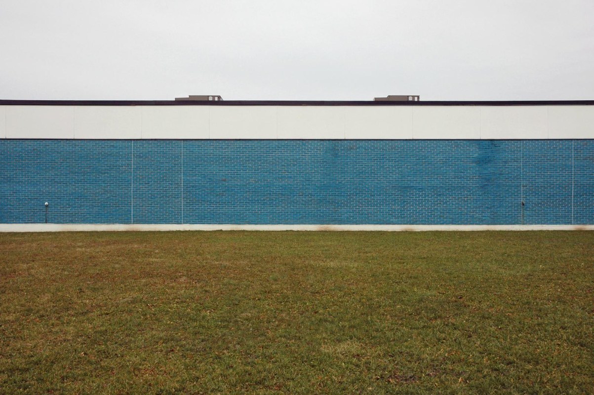Zoe Strauss -
Blue Building with Grass, 2001-2006 | Bruce Silverstein Gallery