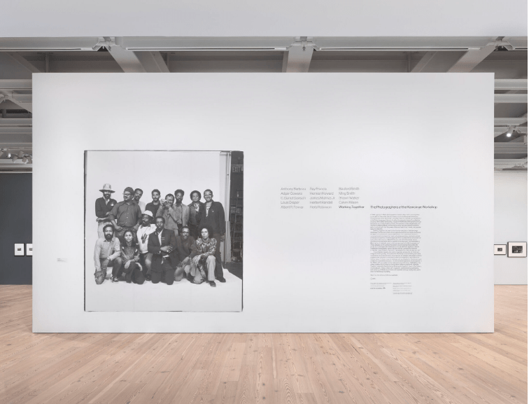 Installation view of Working Together: The Photographers of the Kamoinge Workshop (Whitney Museum of American Art, New York, November 21, 2020–March 28, 2021). Left: Anthony Barboza, Kamoinge Portrait, 1973. Photograph by Ron Amstutz