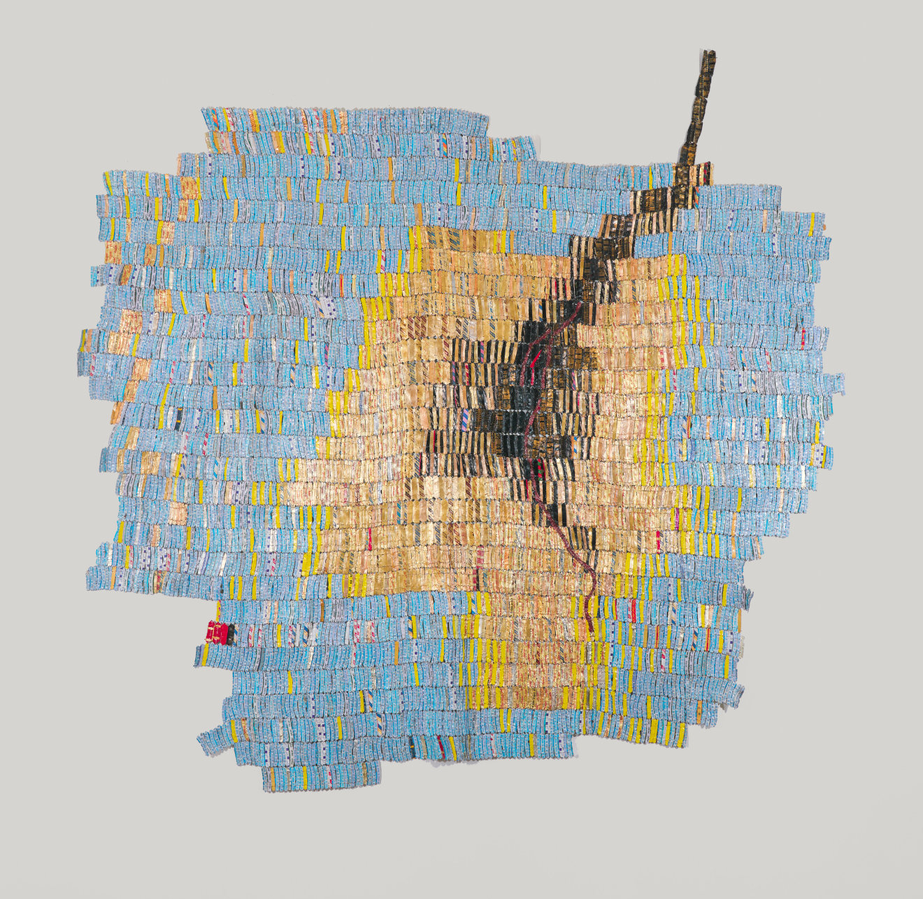 Sculpture by El Anatsui titled Enlightened from 2012