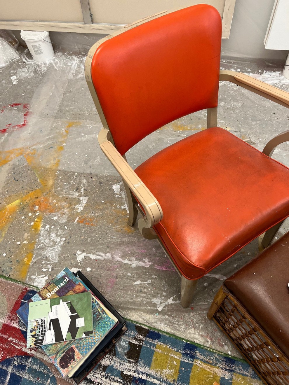 Floor of Ana Benaroya's studio with art catalogues