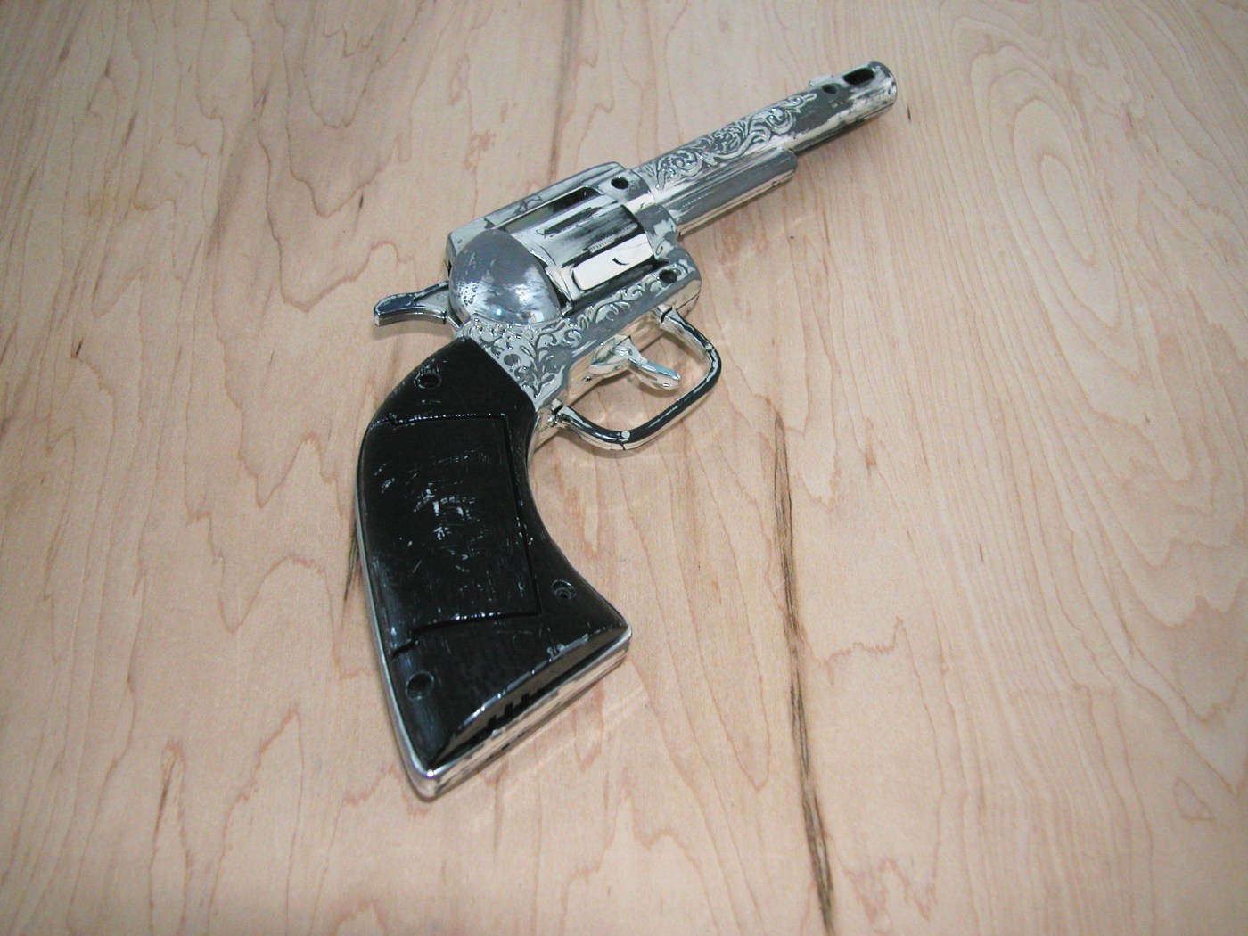 Untitled (For Antigone), 2004, toy gun, radio, 12 x 6 x 1 1/2 inches
