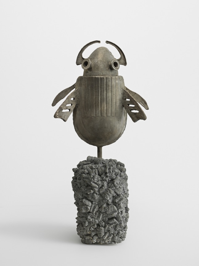 DTW, 2019. Bronze, cement, 10 3/4 x 11 1/2 x 3 inches (27.3 x 29.2 x 7.6 cm).