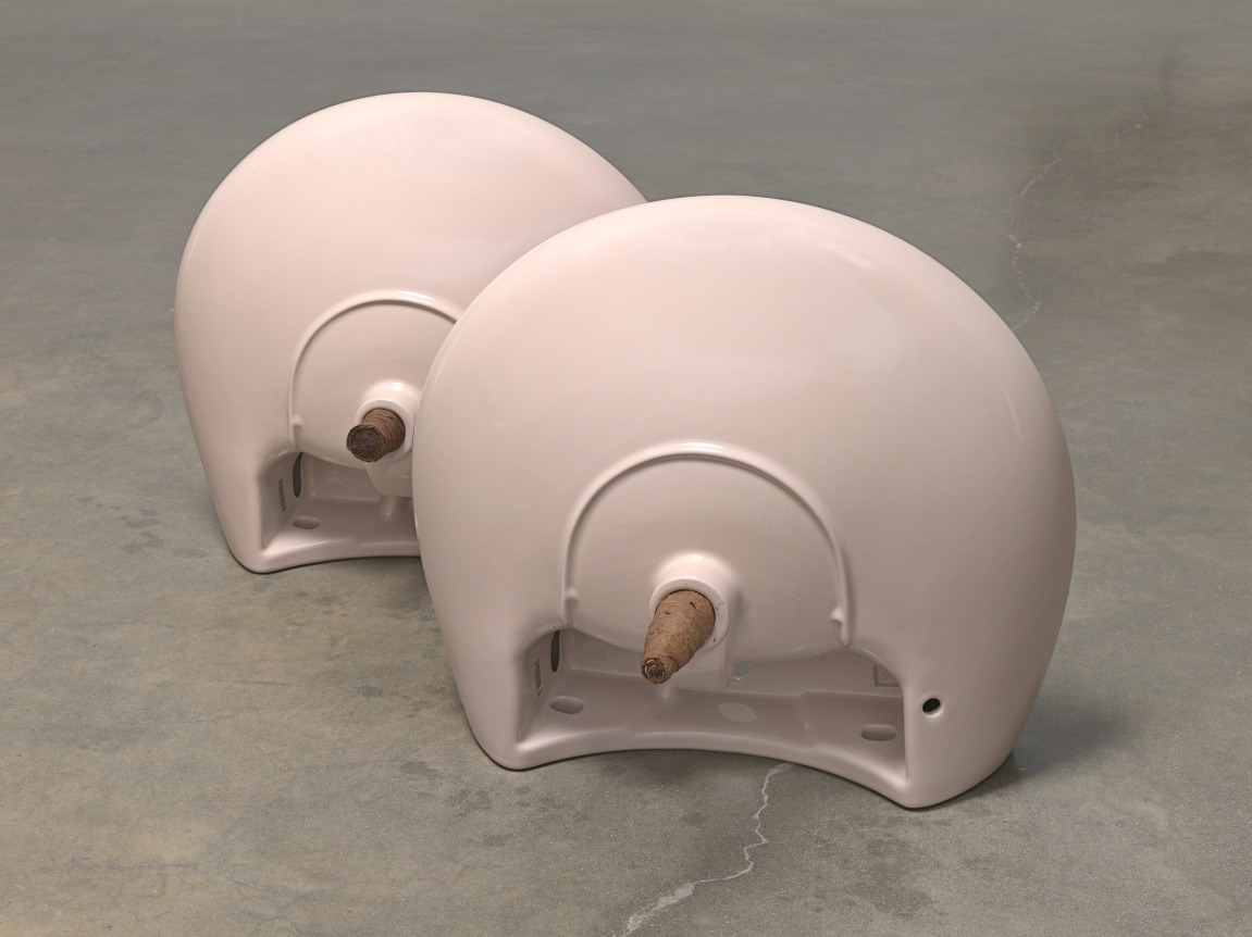 Plug, 2018. Ceramic sinks, hand-rolled cigars,