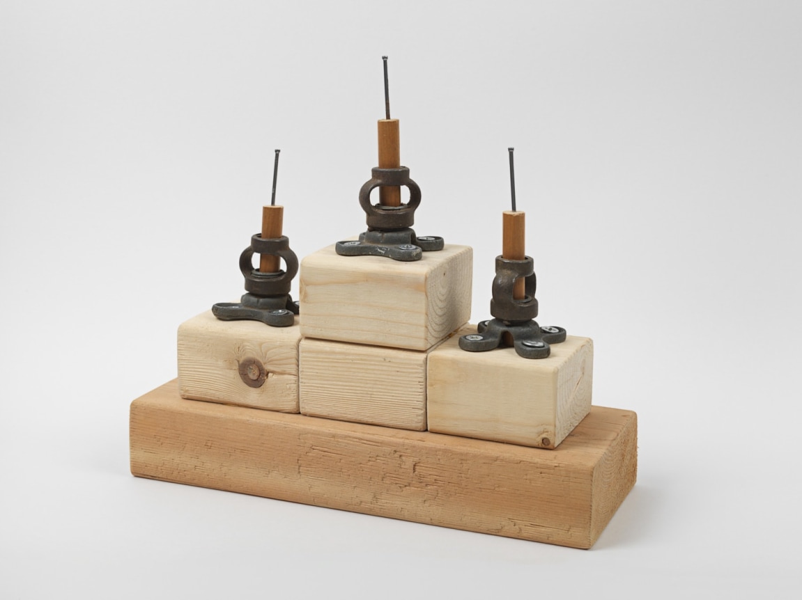 Untitled, 2018. Found lamp parts, wood, screws, nails, 8 1/8 x 8 3/4 x 3 1/4 inches (20.6 x 22.2 x 8.3 cm).