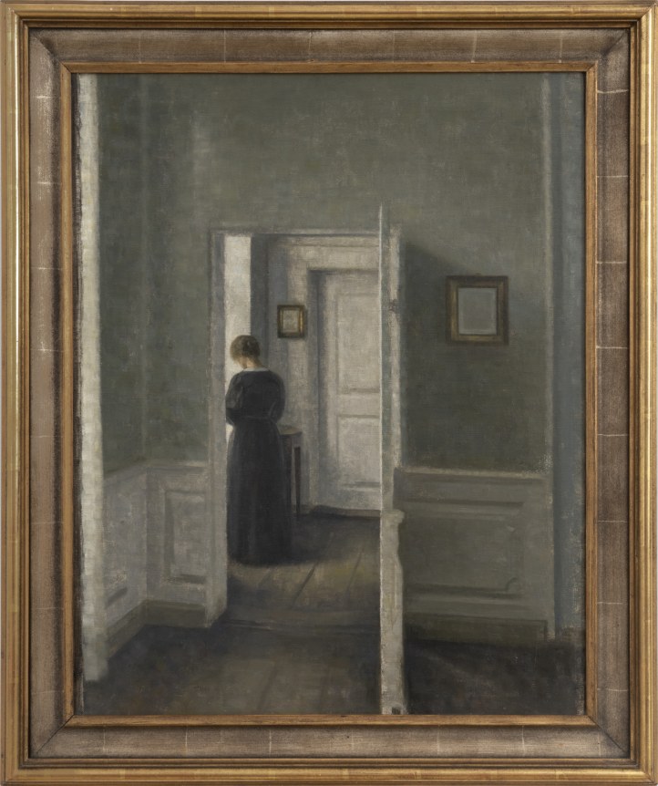 Interior with a Woman Standing Framed Photo