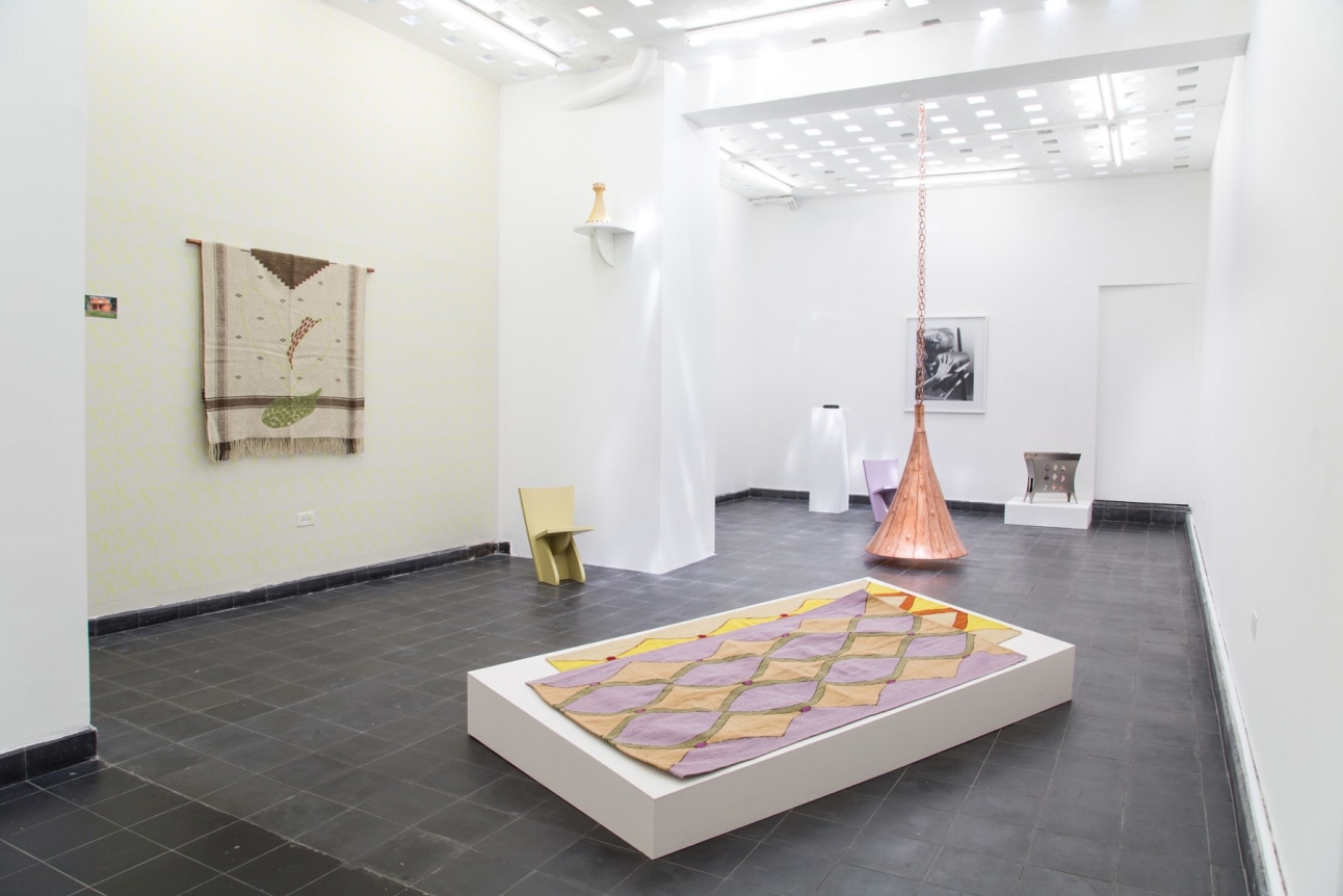 Marc Camille Chaimowicz, A Lampshade, Two Rugs and Child Chairs, a Magazine Rack, Some Vases and Ashtrays, and a Decorated Poncho