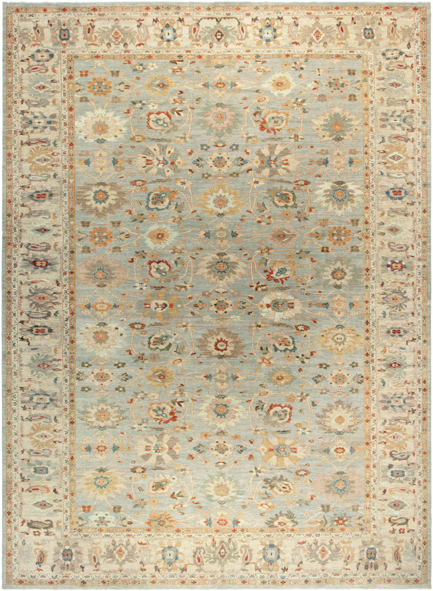 oversized ziegler sultanabad with large beige border and light blue field containing floral motifs throughout