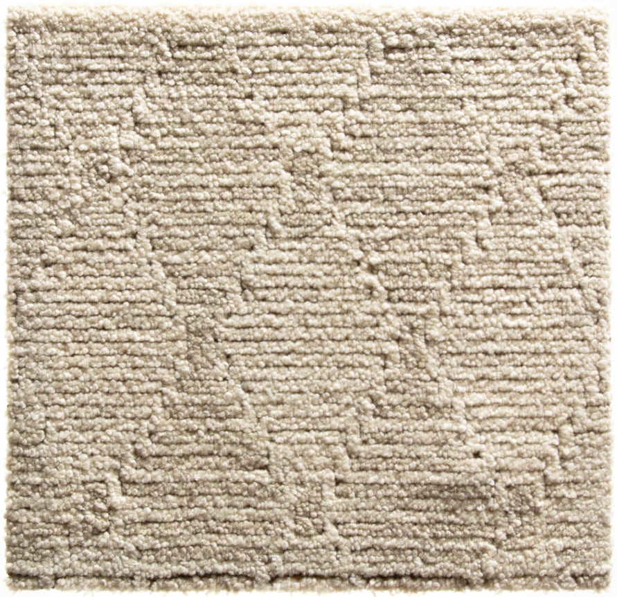 ivory hand-tufted noah sample with a pile and flatweave texture