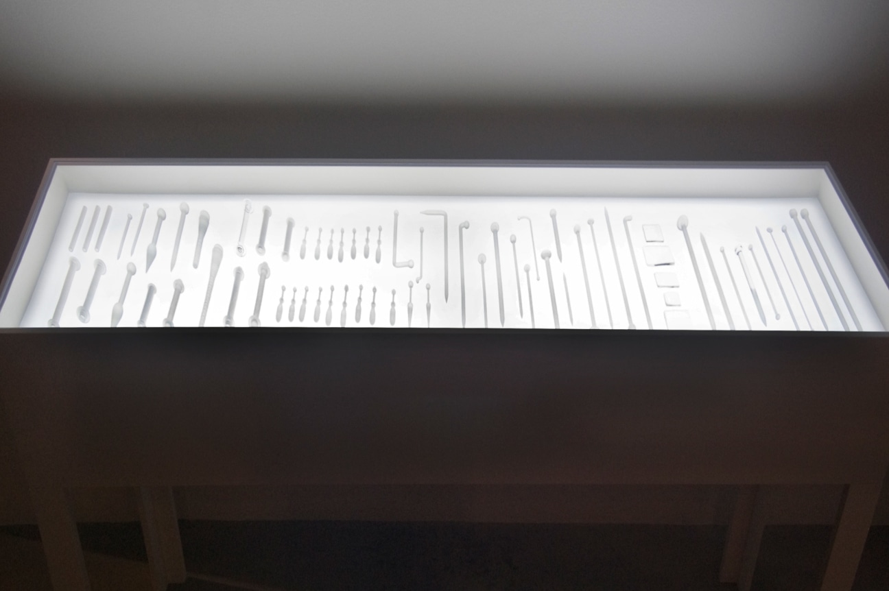 Installation view at Rhona Hoffman Gallery, Anne Wilson, Rewinds, 2011