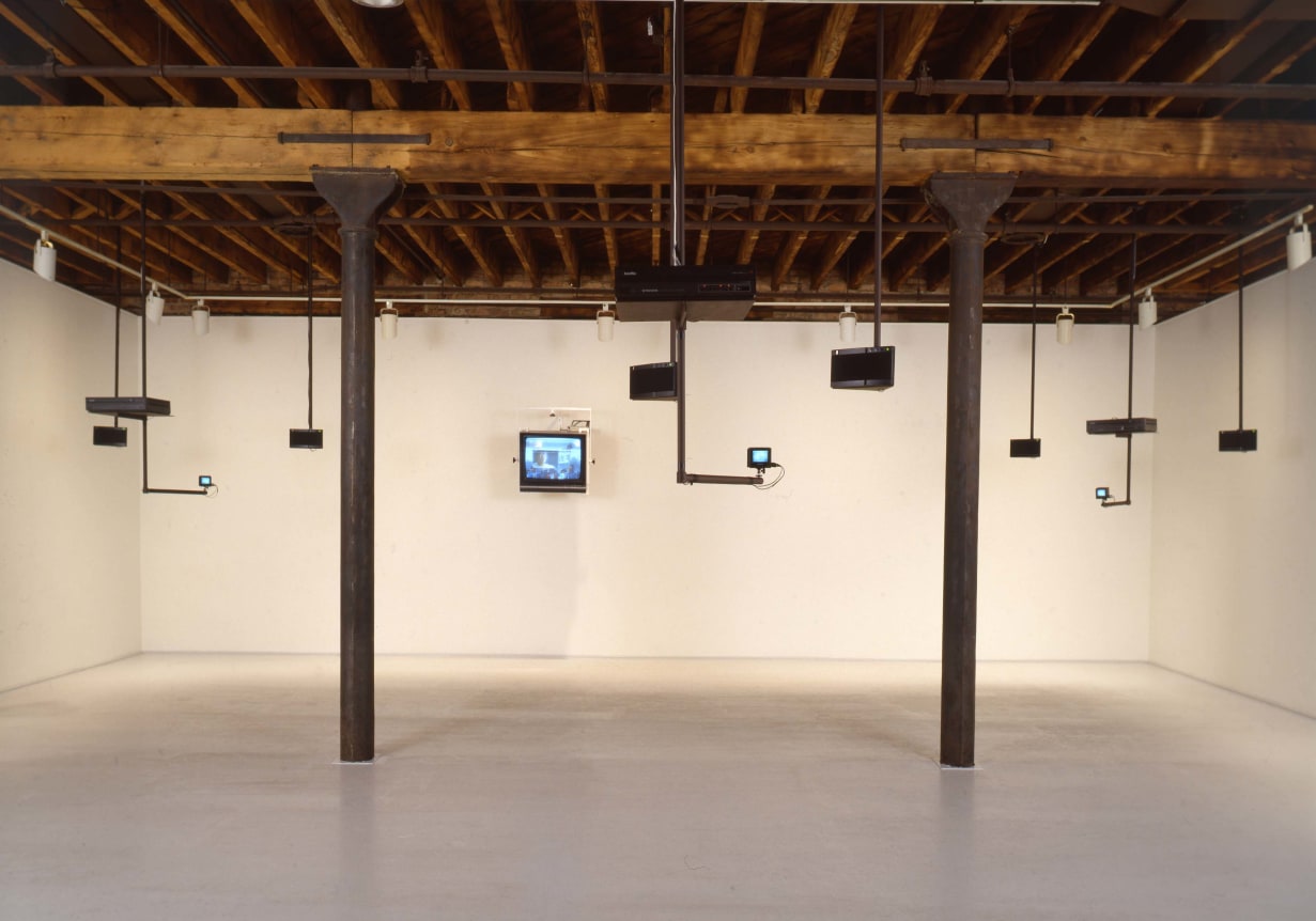 Installation view at Rhona Hoffman Gallery, Dara Birnbaum, 1990.