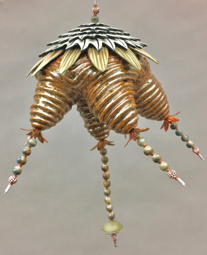 Chris Garofalo.&nbsp;alveare bozzolo,&nbsp;2020. Partially glazed porcelain, copper and porcelain beads, 6 x 6 x 4.5 inches.&nbsp;