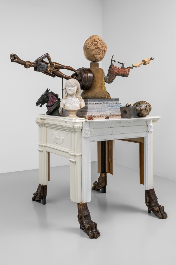 American Golem, 2022, Found antiques, paper mache sculpture, granite, wood, metal base