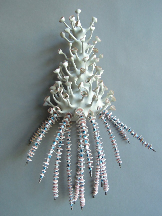 Chris Garofalo.&nbsp;o&euml; wyd oop, 2020. mostly unglazed porcelain, glass beads, 15 x 10 x 5 inches.&nbsp;