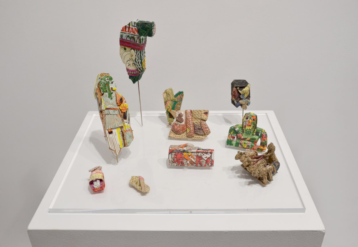 Michael Rakowitz, The Invisible Enemy Should Not Exist (Recovered, Missing, Stolen Series), 2007-09. Middle eastern packaging and newspaper, glue.