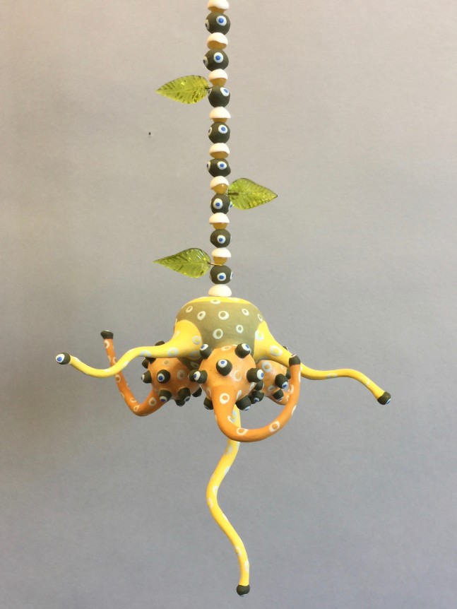 Chris Garofalo.&nbsp;pop oko,&nbsp;2020. Underglazed porcelain, glass leaves, 17 x 6 x 6 inches.&nbsp;