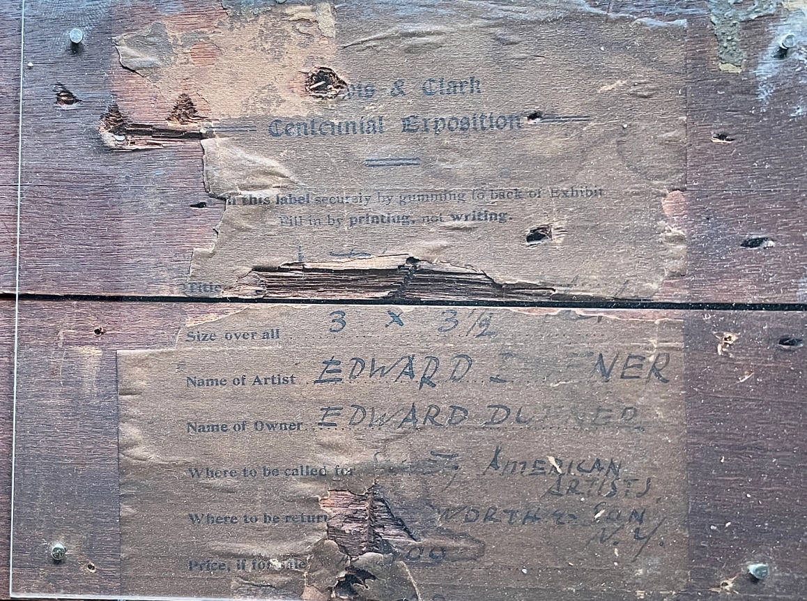 Image of label verso fragment from exhibition label on &quot;River Scene&quot; painting by Edward Dufner.