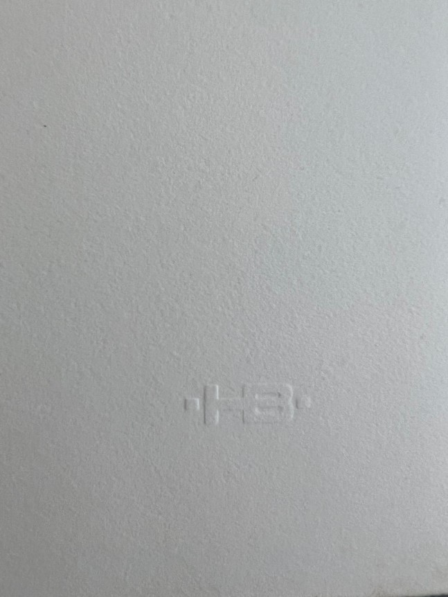 Image of Artist's stamp on untitled (016) abstraction by Hans Burkhardt in deep brown.