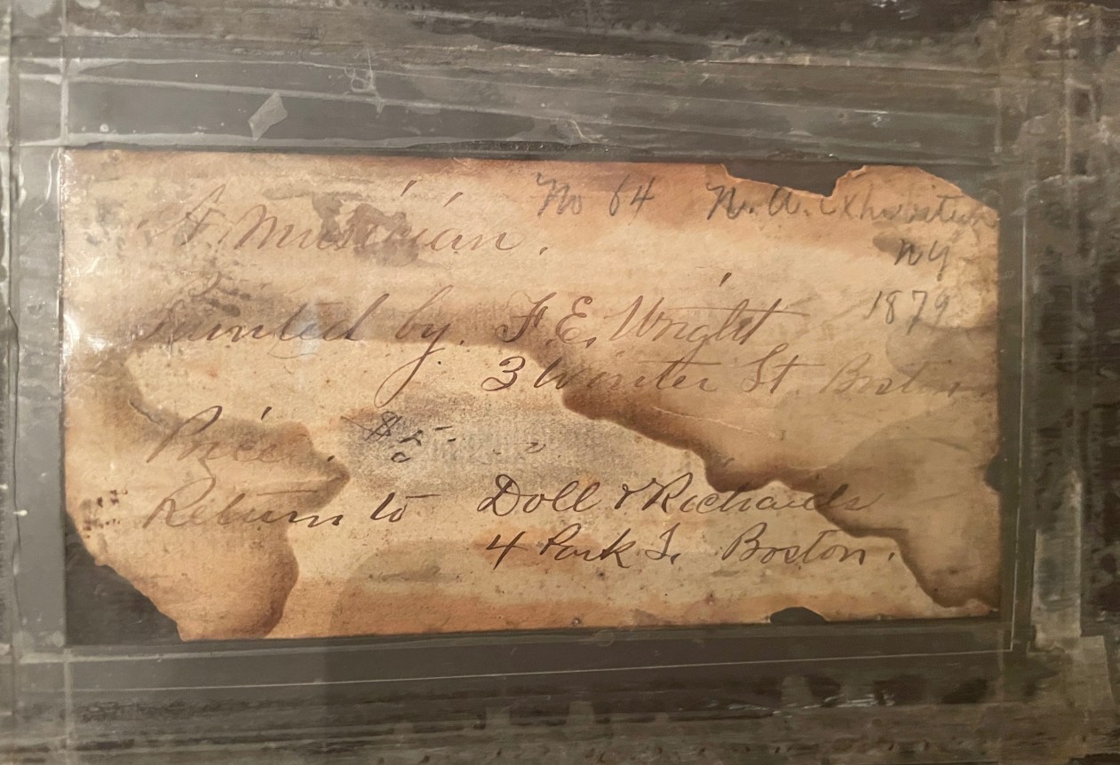 Label verso on &quot;A Musician&quot; by Frederick E. Wright.