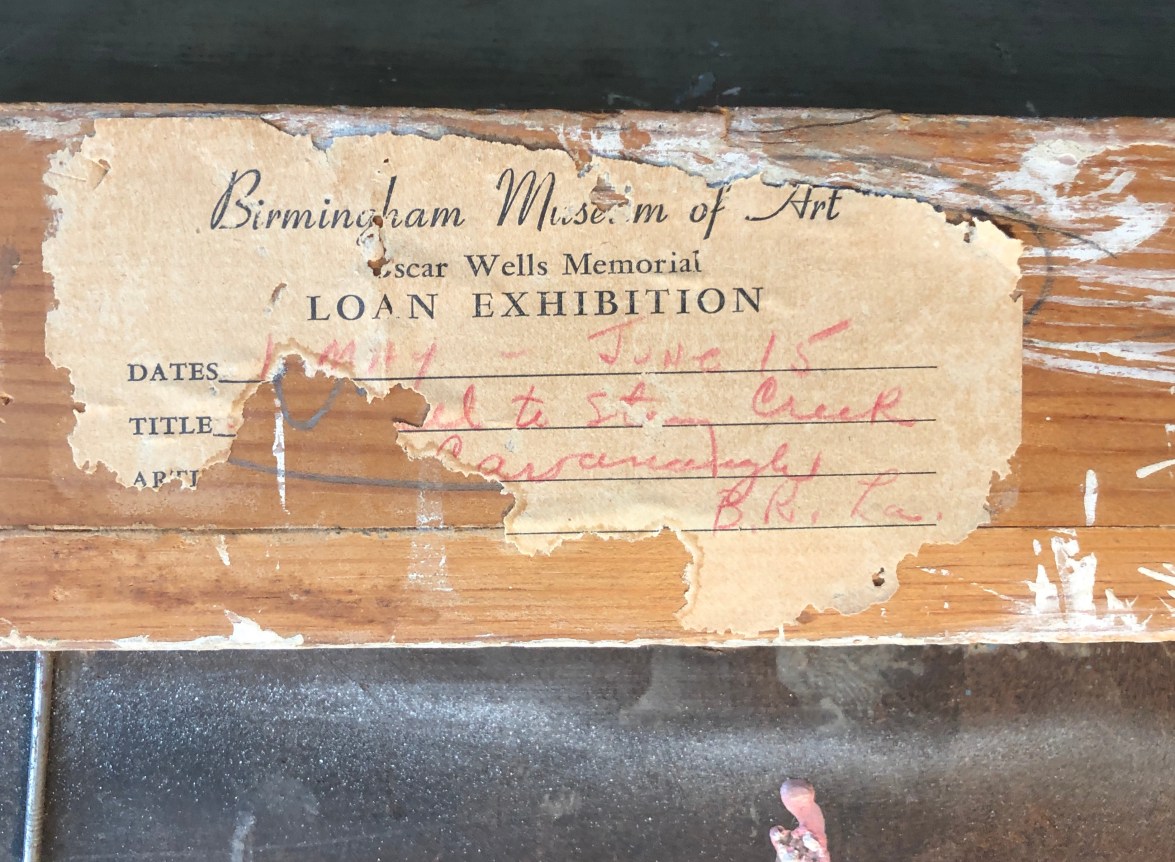 Closeup label fragment from the Birmingham Museum of Art on verso of &quot;Lure of the Waters&quot; painting by Philip Evergood.