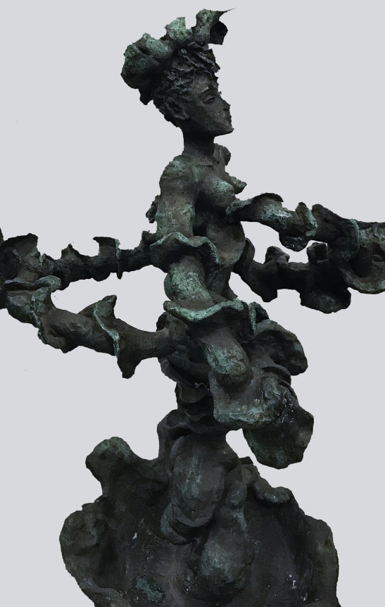 Side view of Yulla with Elaborate Head Piece sculpture by Yulla Lipchitz.