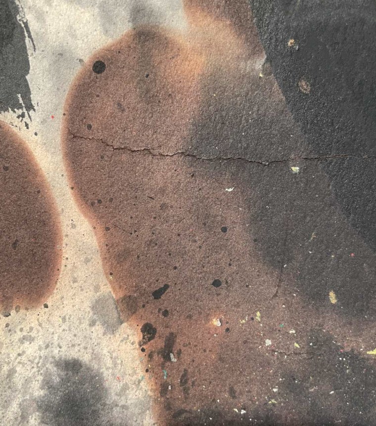 Image of detail on Joan Mir&oacute; 1967 abstract painting &quot;T&ecirc;te de femme&quot; of black, brown, and grey.