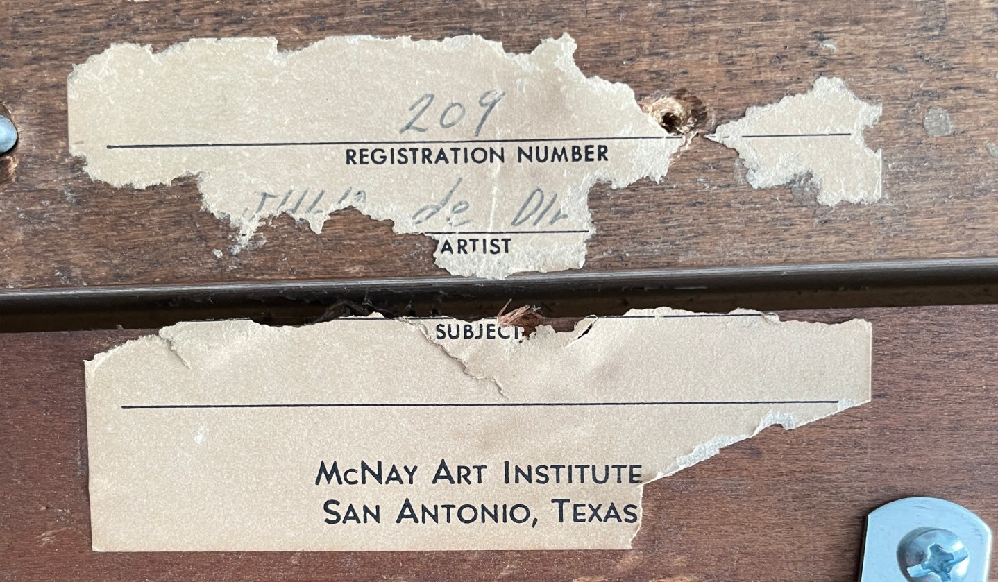 Image of label verso fragment from McNay Art Institute on &quot;The Magician&quot; painting by Julio De Diego.
