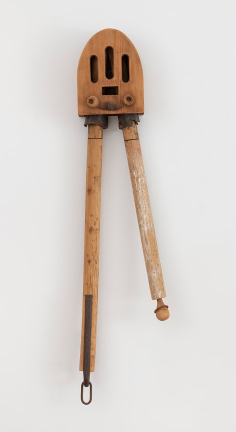 John Outterbridge, "Good News", 1993, mixed media, 47 x 8 1/2 x 7 inches (119 x 22 x 18 cm). A hanging sculpture by John Outterbridge.