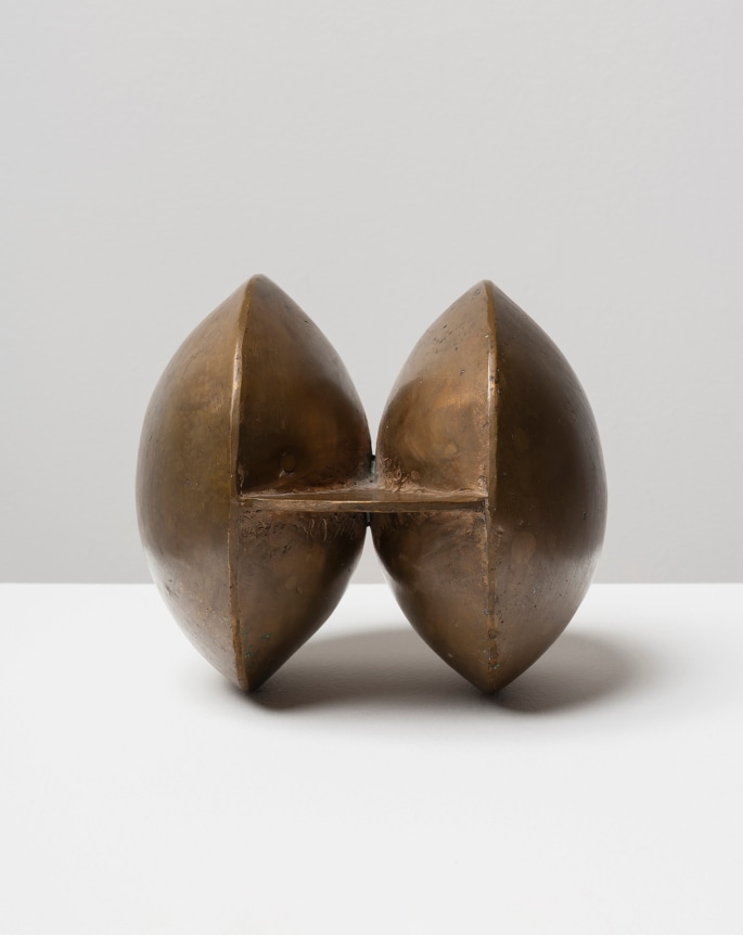 This is an image of a bronze sculpture made by Ruth Vollmer in 1967 titled: Equatorial Disc.