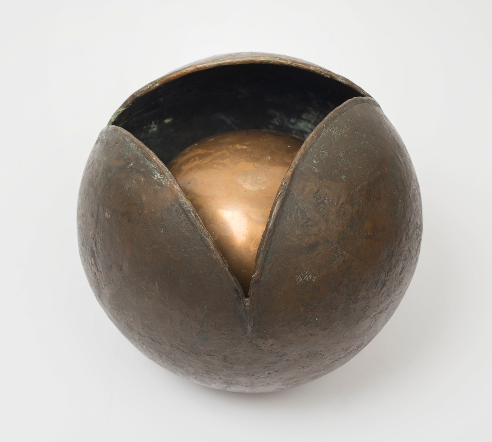 This is an image of a bronze sculpture made by Ruth Vollmer in 1965 titled: Rumblings Within.