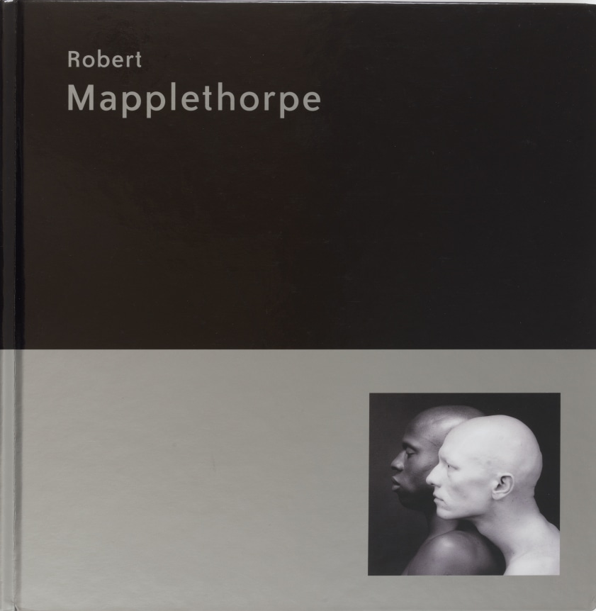 Small reproduction of Ken Moody and Robert Sherman in the corner of cover, black band on top and silver on bottom. Silver text at top of page.