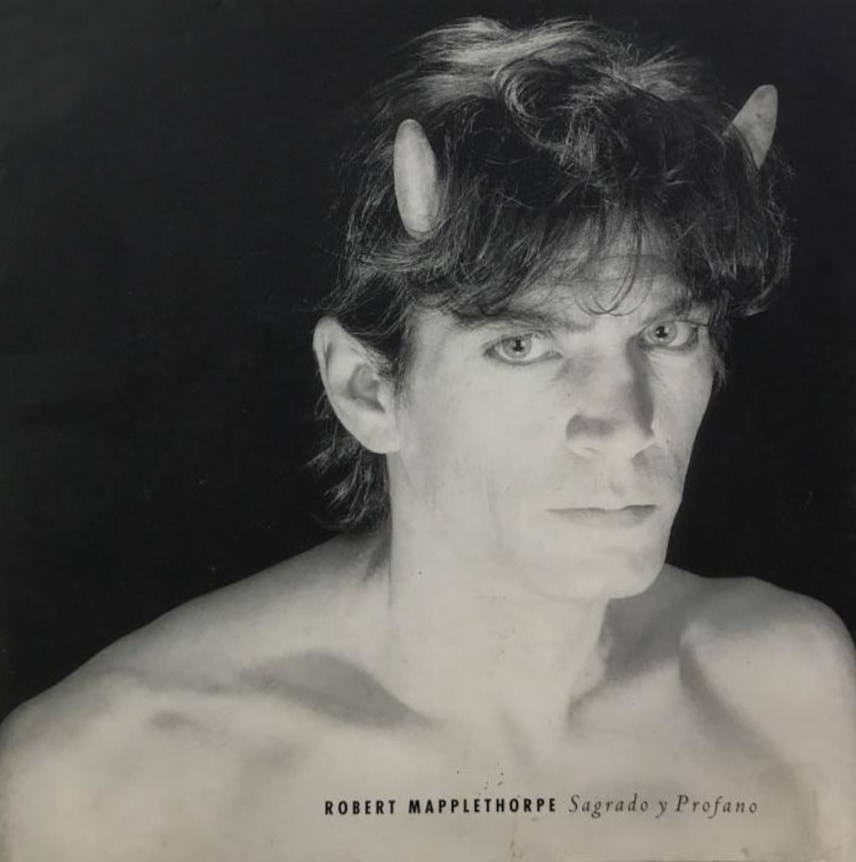 Self-portrait with devil horns