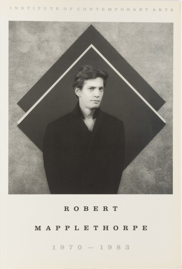 Self Portrait with arms behind back in front of geometric shape. Black text on white ground.